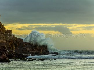 waves crashing into rocks